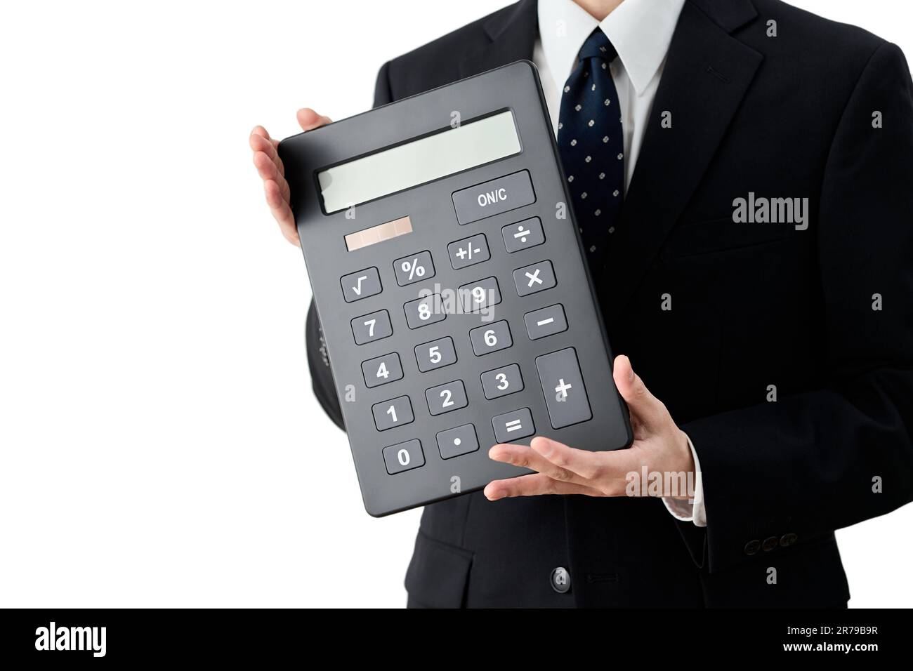 Asian businessman with big calculator Stock Photo