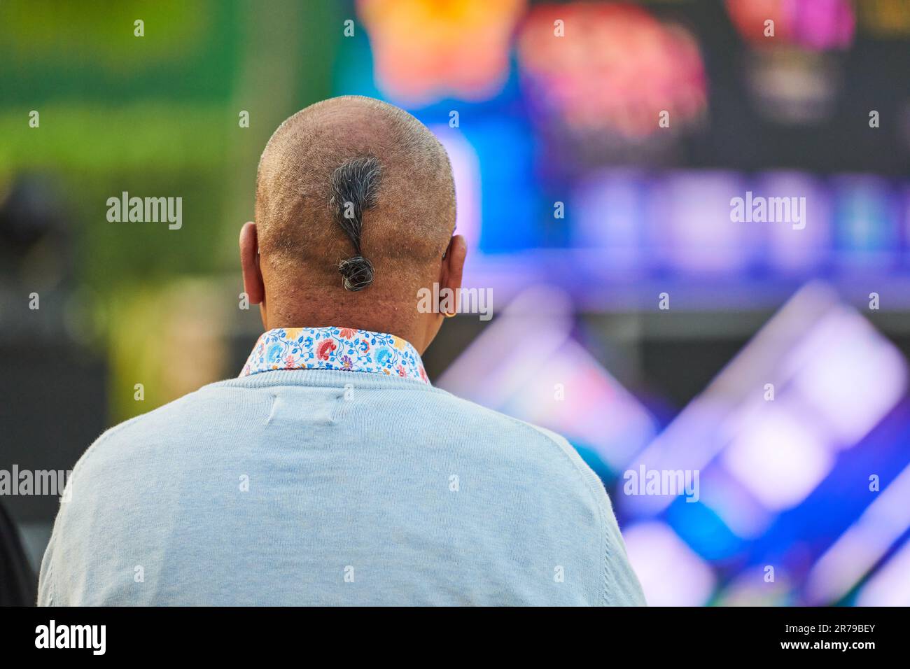 Back view of adult man head with ukrainian chub haircut at outdoor ...