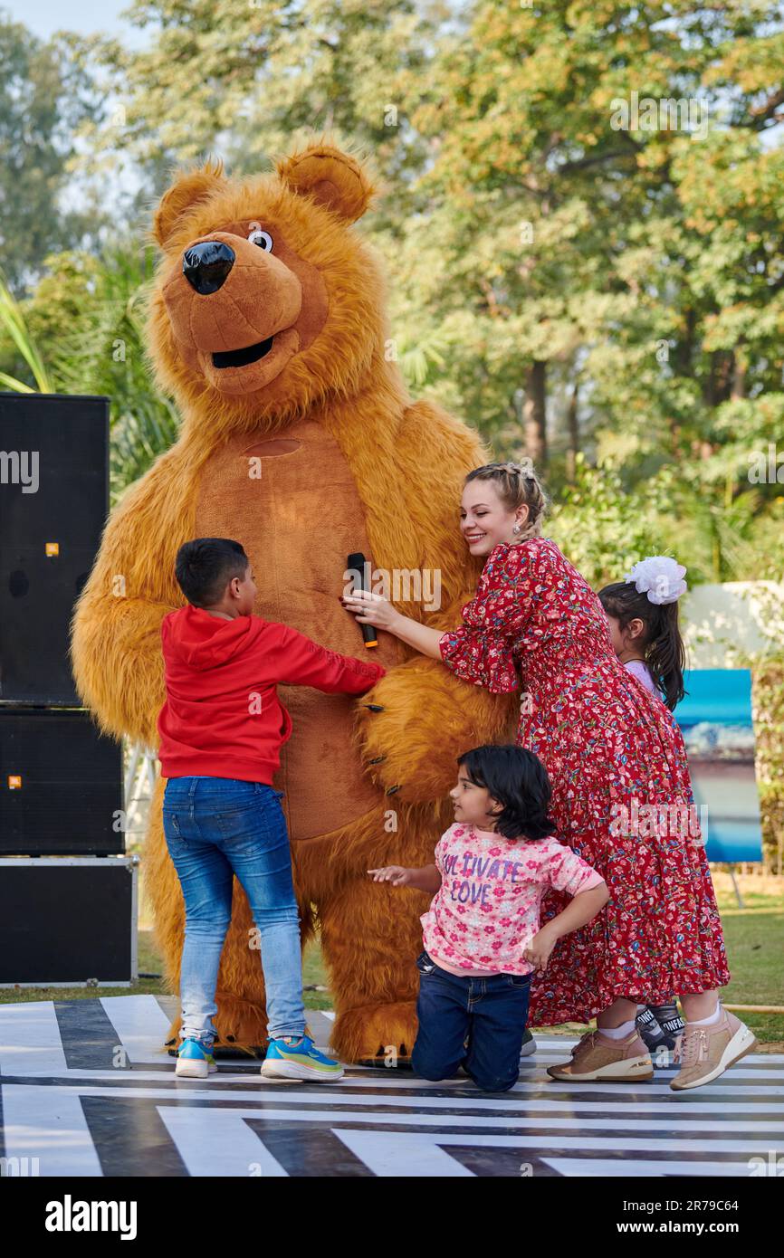 New Delhi India 10 12 2022 Children Hugs Big Toy Teddy Bear At new-delhi-india-10-12-2022-children-hugs-big-toy-teddy-bear-at