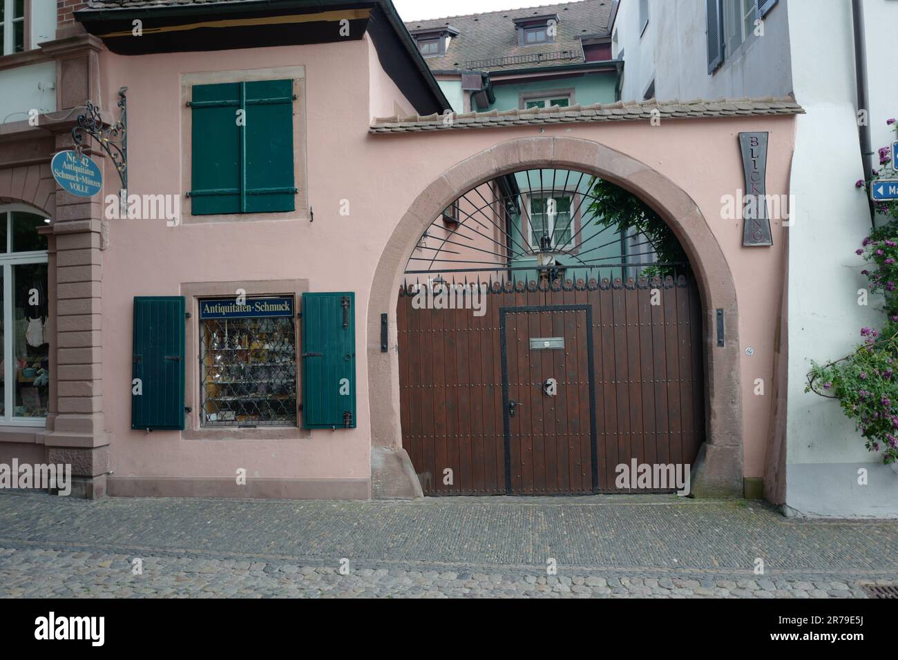 Historic house in pink color in Freiburg im Breisgau Stock Photo