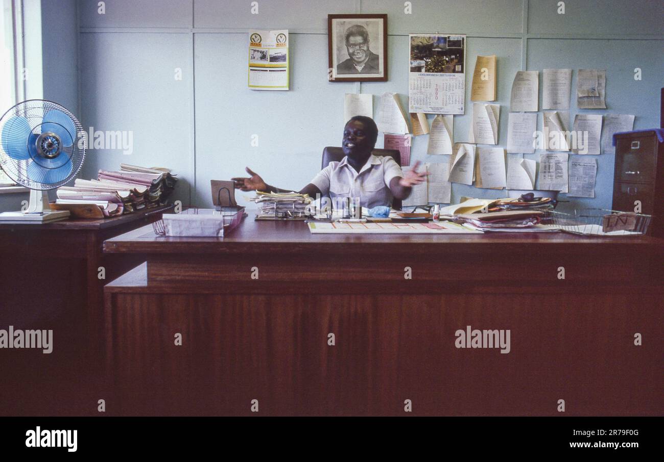 Zambia, Western Province. the mayor at work in Mongu town hall with a