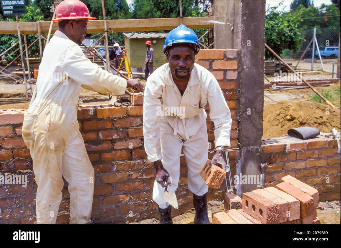 Zimbabwe, Harare. construction workers at work with new construction of