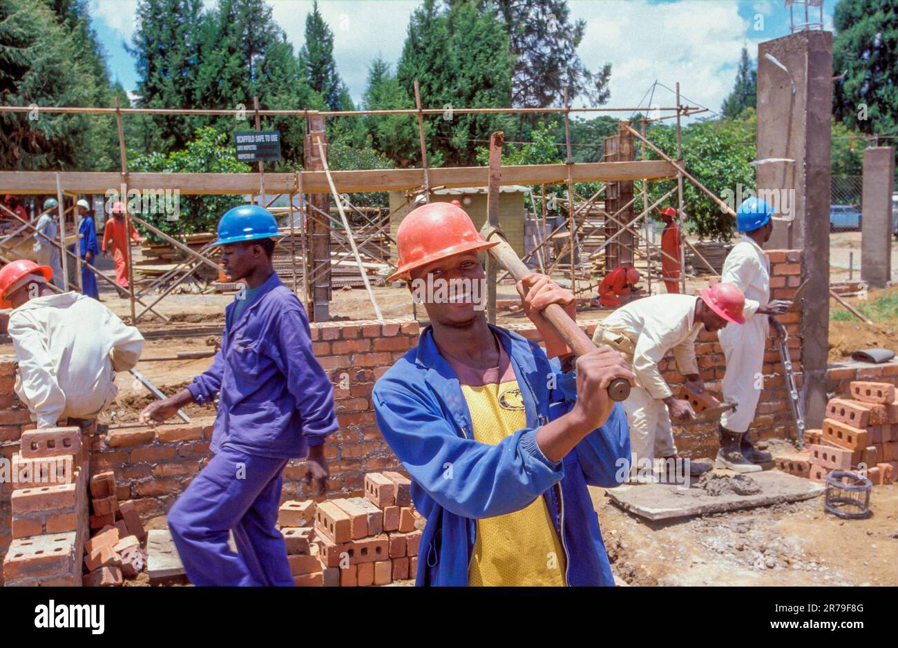 Zimbabwe, Harare. construction workers at work with new construction of
