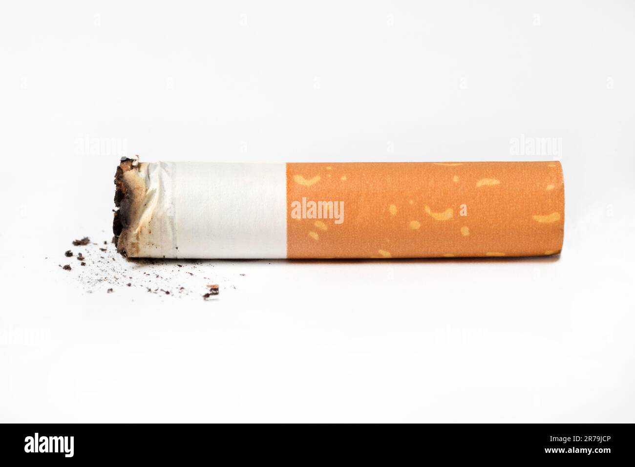 A closeup of a cigarette burn isolated at the white background Stock