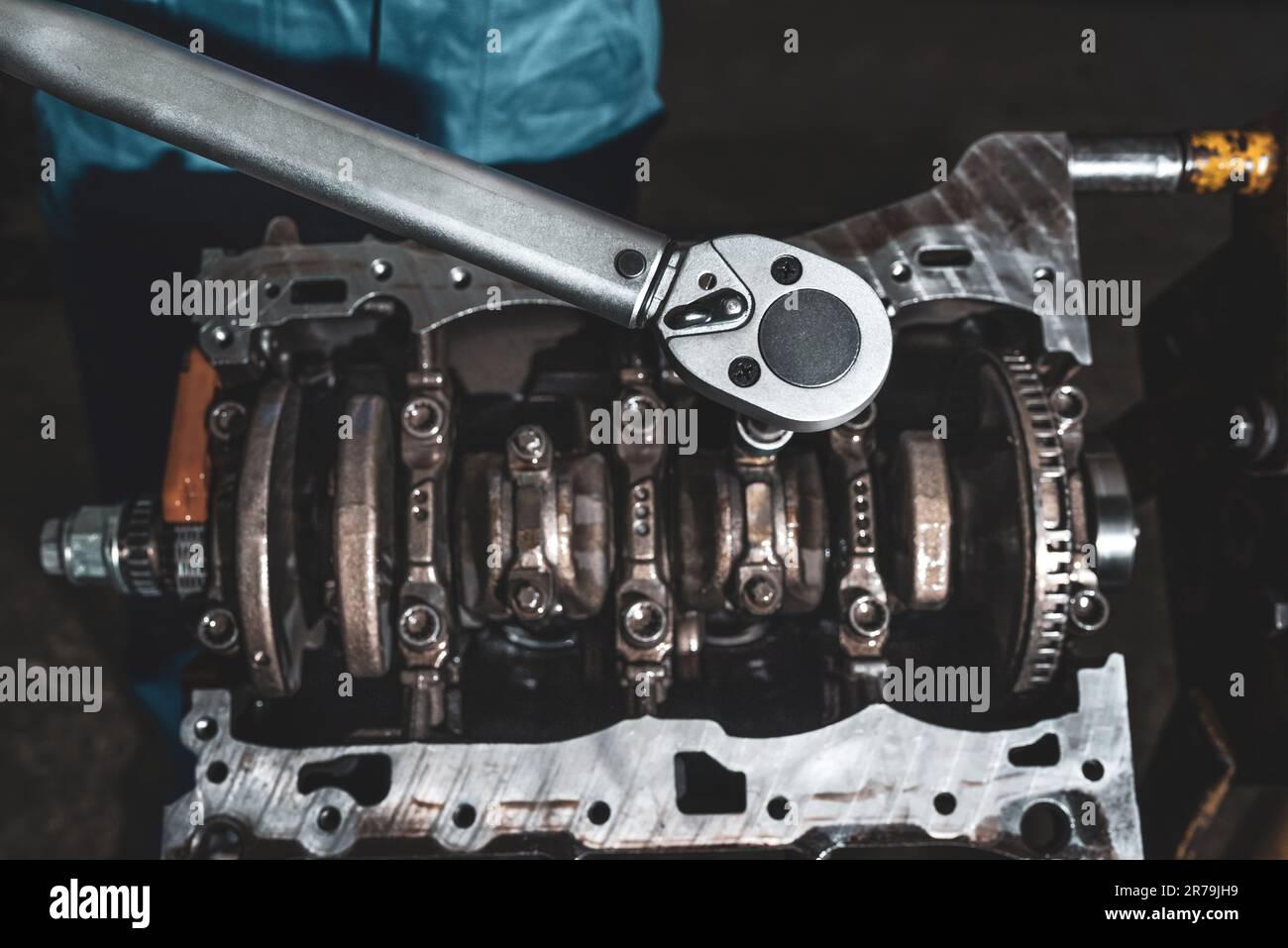 Wrench and car engine closeup. Car parts Stock Photo Alamy