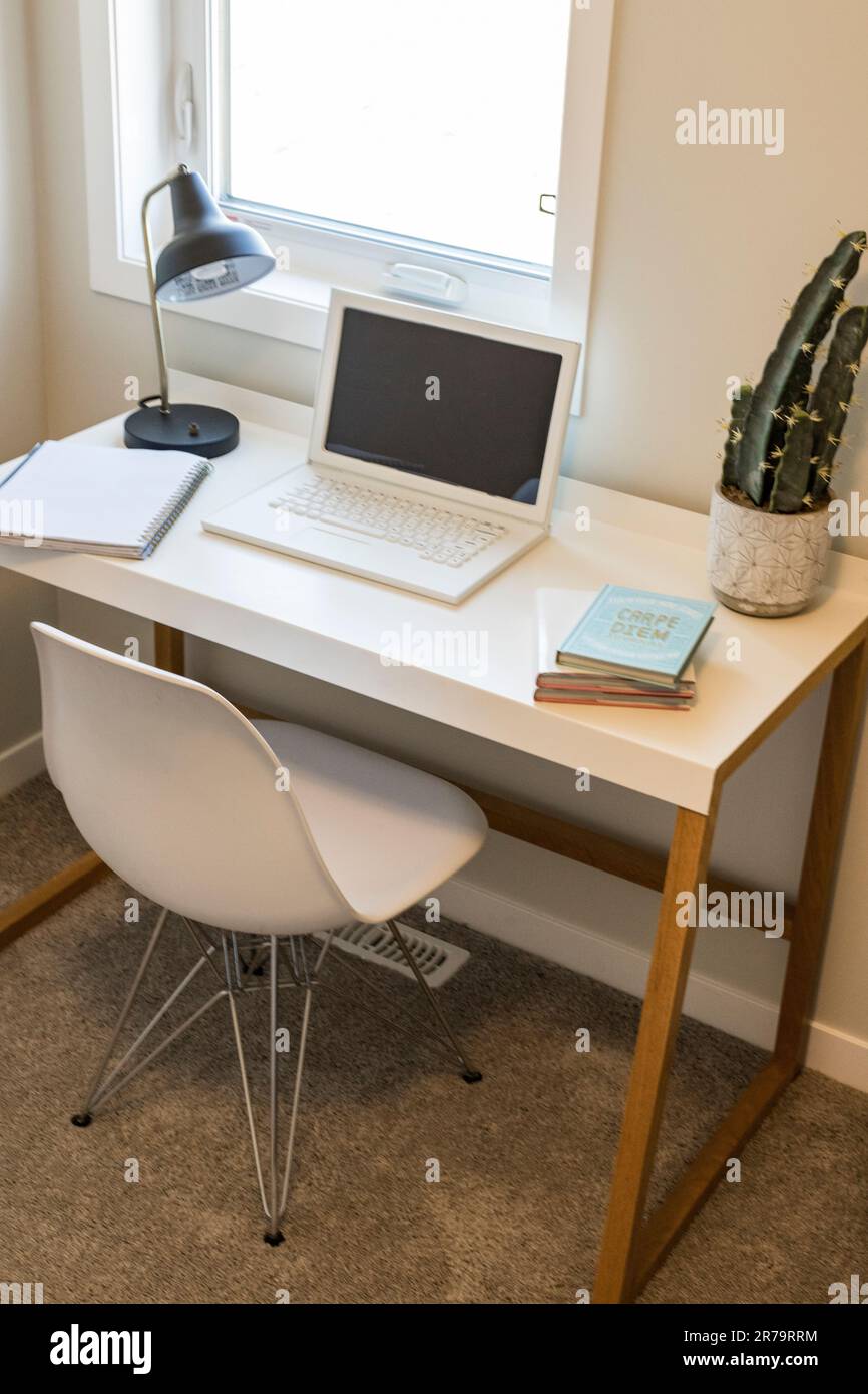 A modern home interior design with a laptop on a desk Stock Photo - Alamy