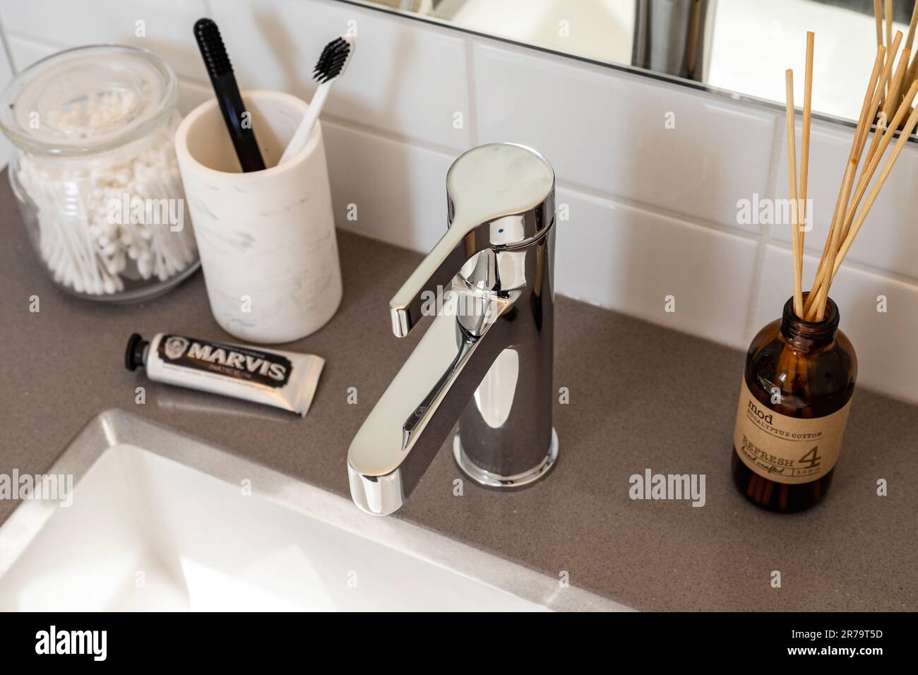 An interior design of a tap in a modern bathroom Stock Photo - Alamy