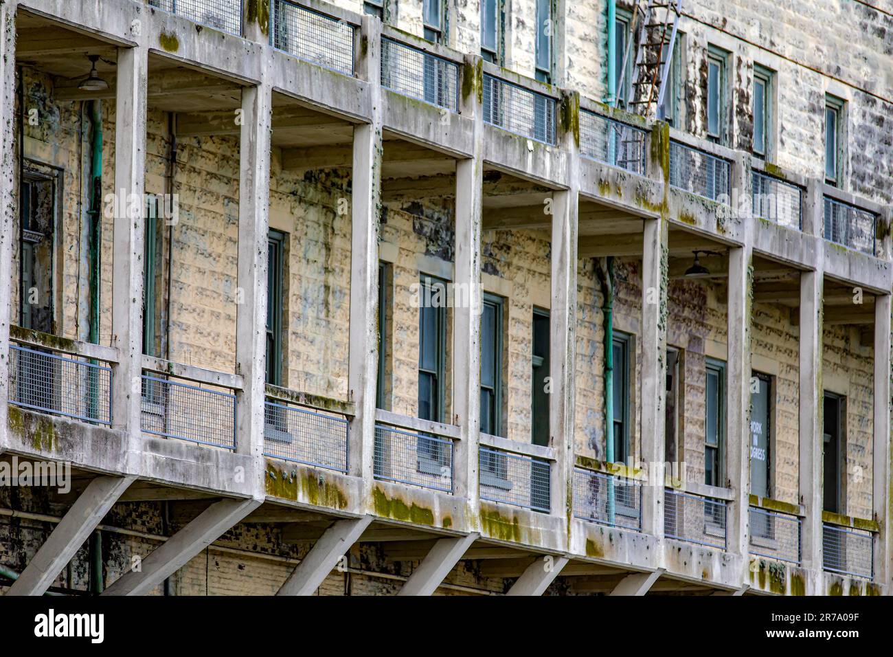 Facade of the barracks and theater of the federal prison on Alcatraz Island of the United States in the bay of San Francisco, California, USA. Stock Photo