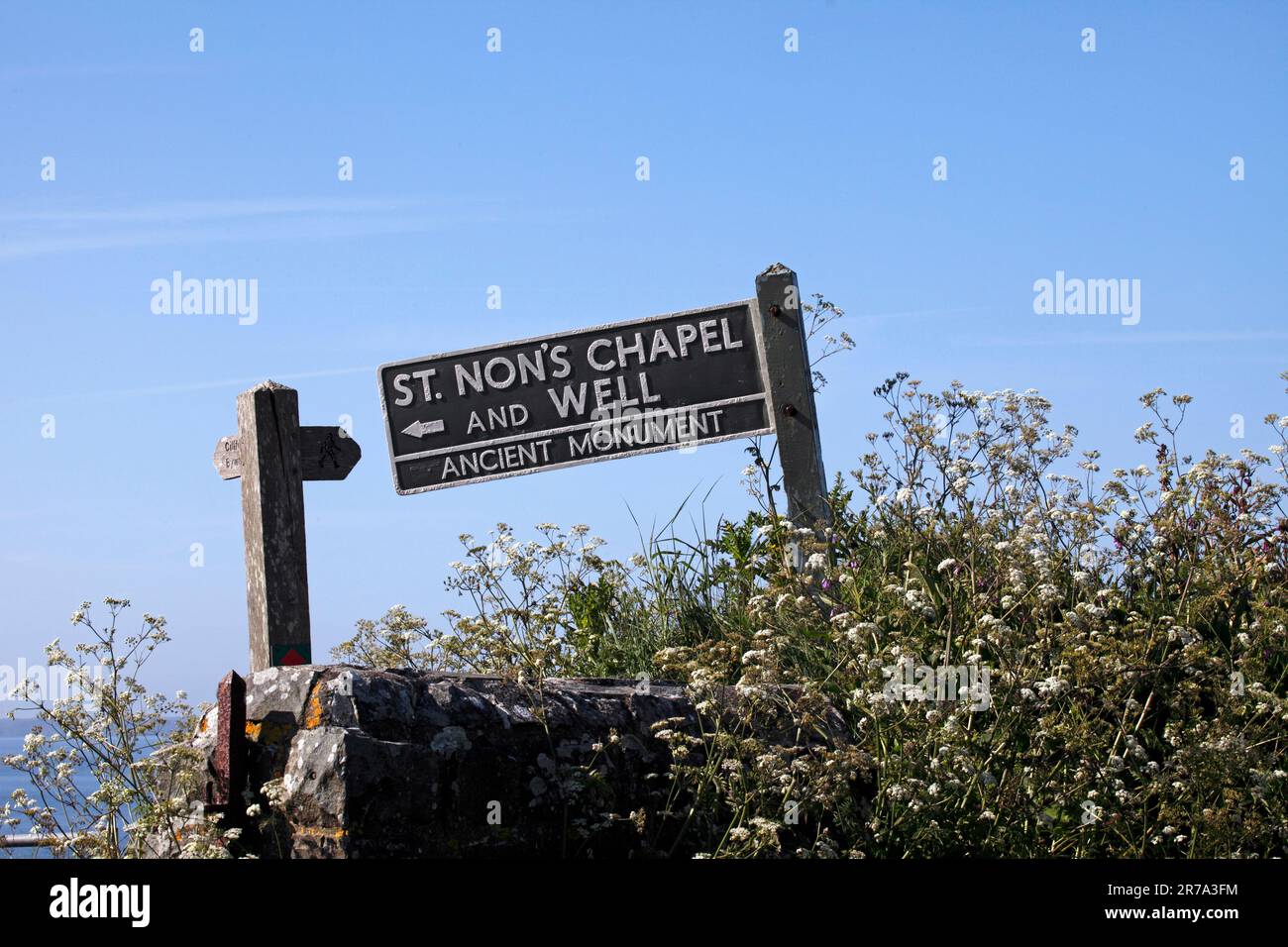 Sign fo St Non's chapel and Well, Ancient monument. Stock Photo