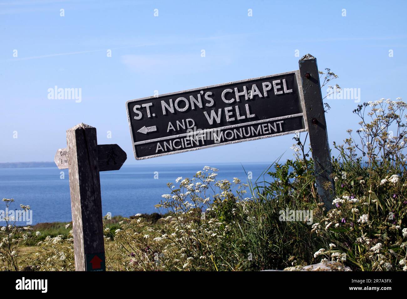 Sign fo St Non's chapel and Well, Ancient monument. Stock Photo