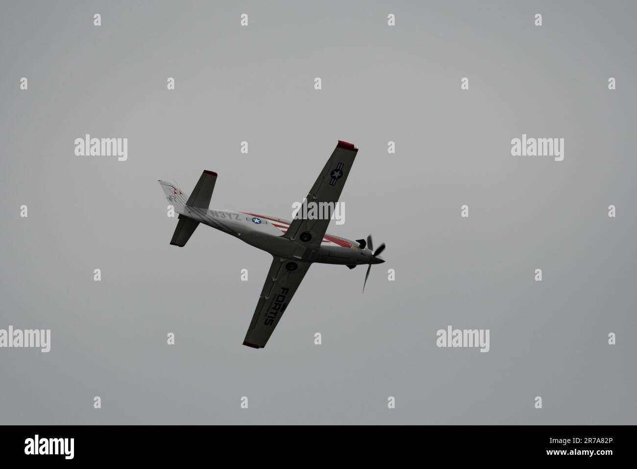 Rhine Valley, Saint Gallen, Switzerland, May 20, 2023 N-3YZ Amateur turbine legend propeller airplane performance during an air show seen from the top Stock Photo