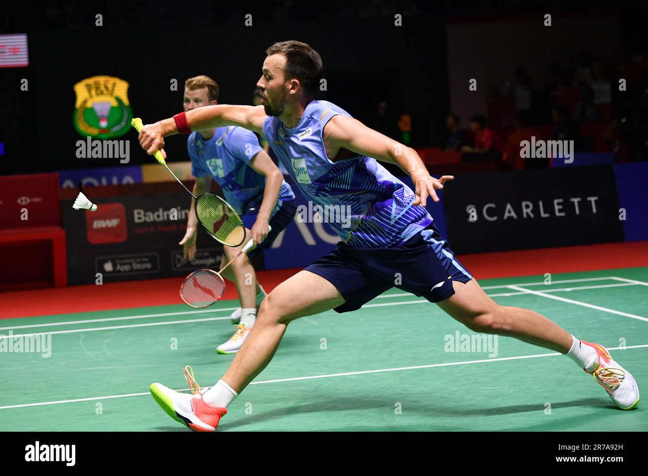 Jakarta, Indonesia. 14th June, 2023. Denmark's Kim Astrup/Anders Skaarup Rasmussen (R) compete during the men's doubles first round match against China's Liu Yuchen/Ou Xuanyi at Indonesia Open 2023 in Jakarta, Indonesia, June 14, 2023. Credit: Xu Qin/Xinhua/Alamy Live News Stock Photo
