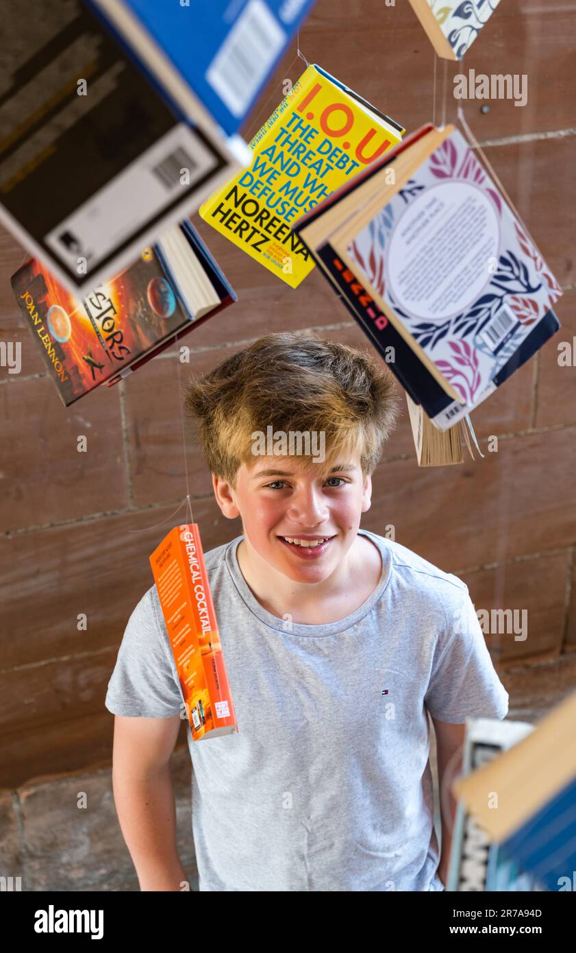 Edinburgh, Scotland, UK, 14 June 2023. Edinburgh International Book Festival launch: the programme for 40th book festival is launched at its venue Edinburgh College of Art. Pictured: Corin, aged 12 years and a book lover, launches this year's programme. Credit: Sally Anderson/Alamy Live News Stock Photo