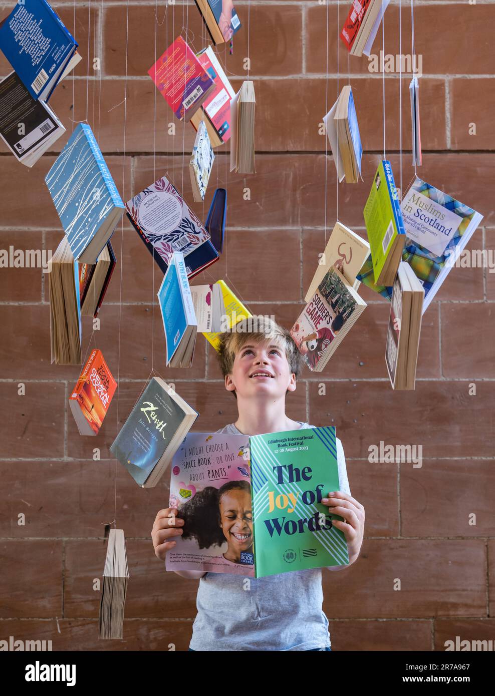 Edinburgh, Scotland, UK, 14 June 2023. Edinburgh International Book Festival launch: the programme for 40th book festival is launched at its venue Edinburgh College of Art. Pictured: Corin, aged 12 years and a book lover, launches this year's programme ‘The Joy of Words’. Credit: Sally Anderson/Alamy Live News Stock Photo
