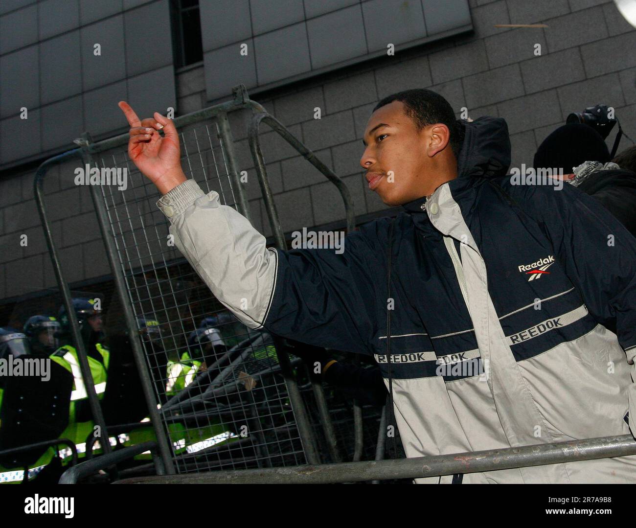 Proestor Shield young protestor outside Israeli embassy in London moments before being ...