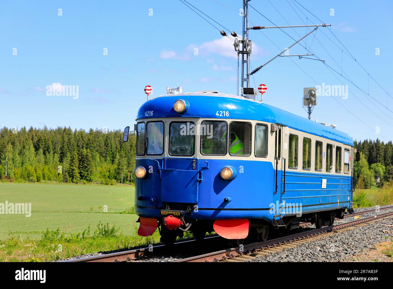 A preserved Blue VR Class Dm7 diesel multiple unit no 4216 near Humppila, Finland. June 9, 2023. 'Flat caps' used to operate in local rail traffic. Stock Photo