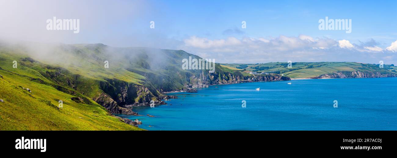 Sea Fret over Cliffs, Start Point Lighthouse, Trinity House and South West Coast Path, Devon, England Stock Photo
