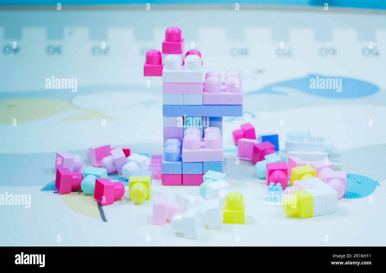 A set of colorful plastic toy construction blocks Stock Photo - Alamy