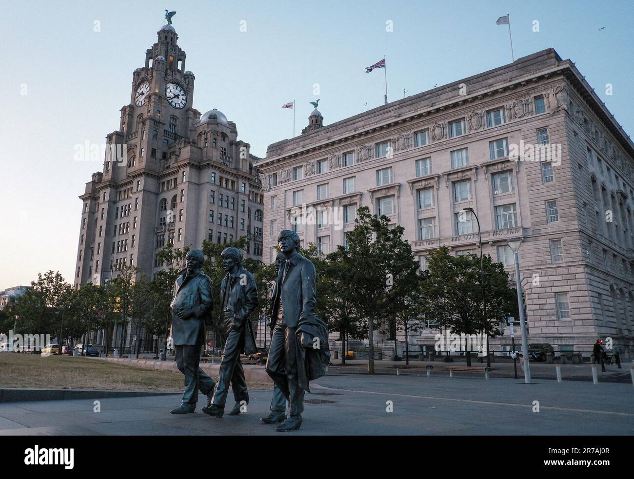 The Liver building and The Beatles statue at Royal Albert Dock in Liverpool Stock Photo