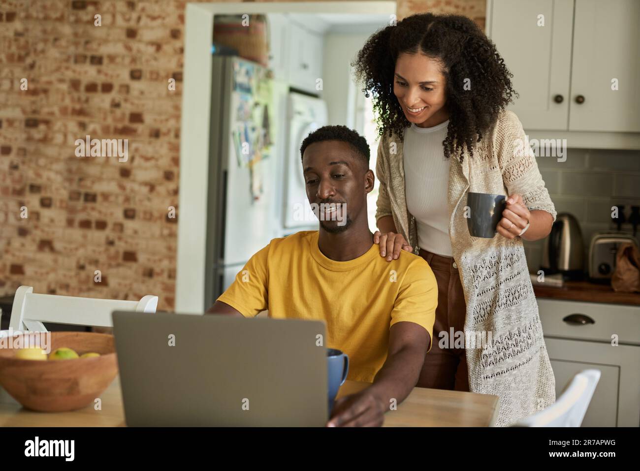 African american couple smiling using hi-res stock photography and ...