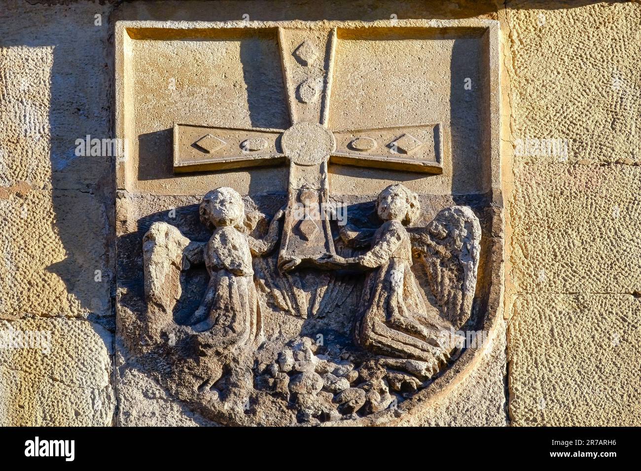 Medieval sculpture of angels and cross, Oviedo, Spain Stock Photo