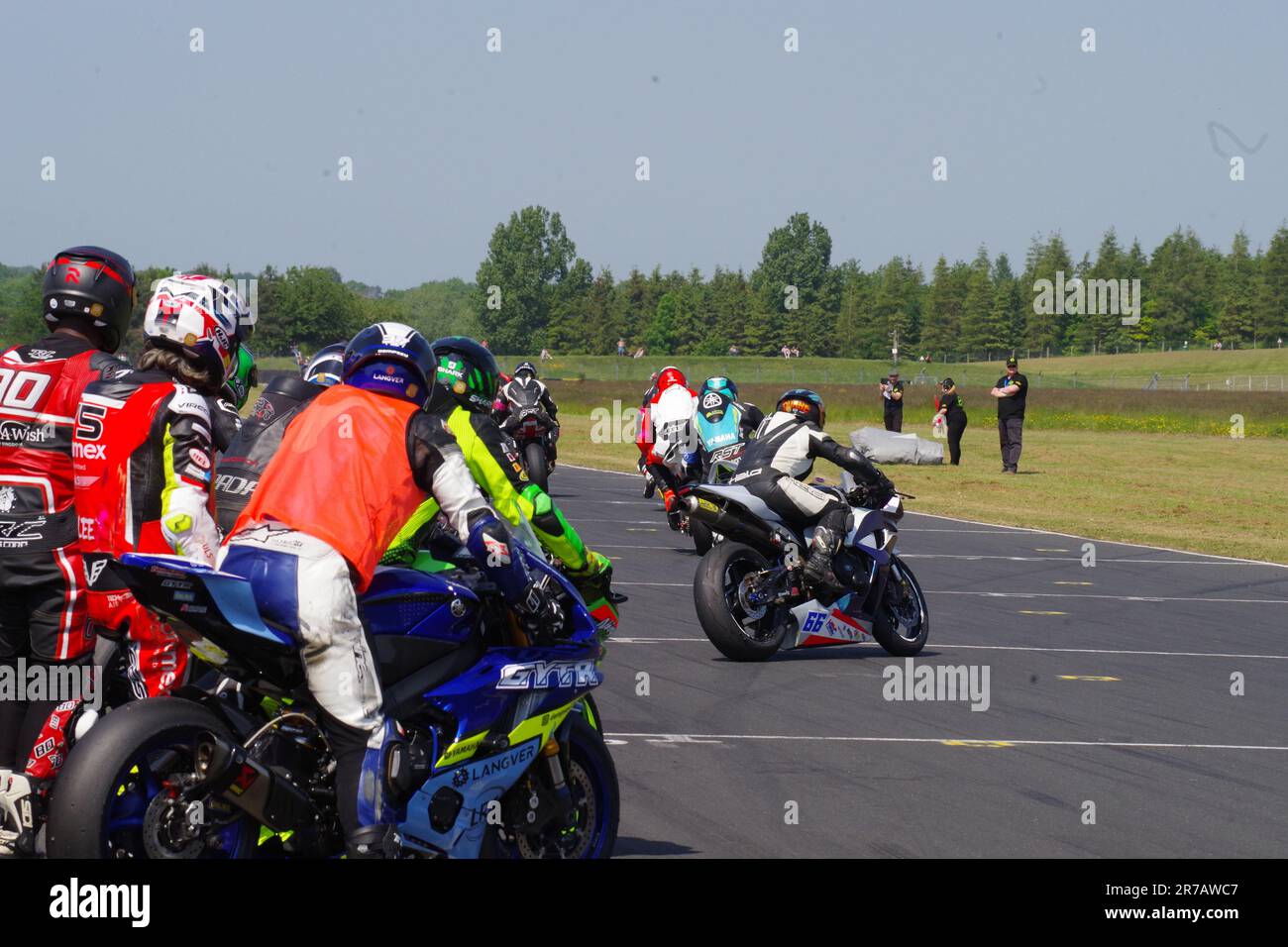 Croft Circuit, 10 June 2023. Riders starting the warm up lap for the
