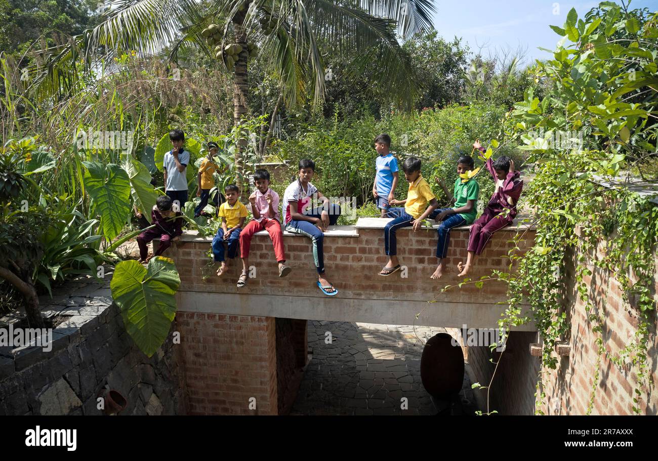 View late afternoon with kids. Subteranian Ruins, Kaggalipura, Bangalore, India. Architect: A Threshold Architects, 2023. Stock Photo