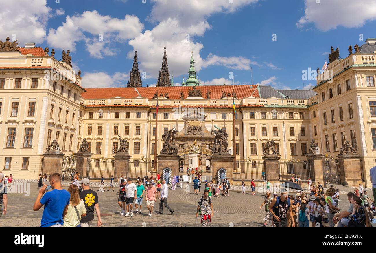 HRADCANY, PRAGUE, CZECH REPUBLIC, EUROPE - Tourists at Western Gate to Prague Castle, in Hradcany Square. Stock Photo
