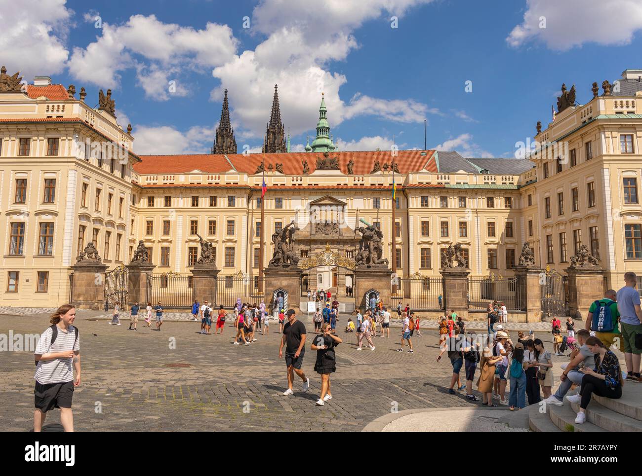 HRADCANY, PRAGUE, CZECH REPUBLIC, EUROPE - Tourists at Western Gate to Prague Castle, in Hradcany Square. Stock Photo