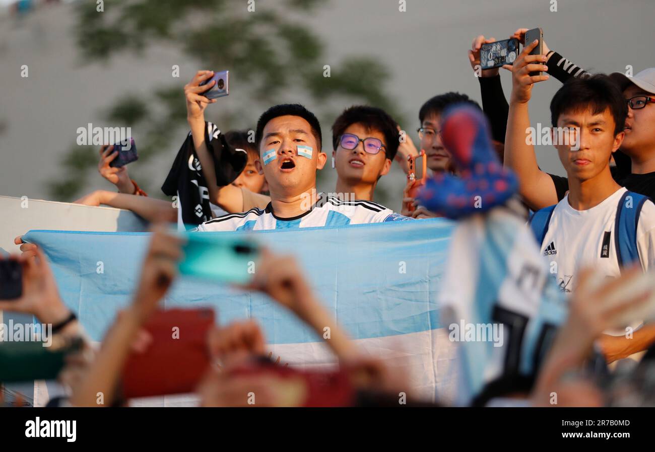 Beijing, China. 14th June, 2023. Supporters cheer as coach of Argentina team arrives ahead of a training session for an international friendly match between Argentina and Australia at Beijing Workers' Stadium in Beijing, June 14, 2023. Argentina will play against Australia here on Thursday. Credit: Zhang Chen/Xinhua/Alamy Live News Stock Photo