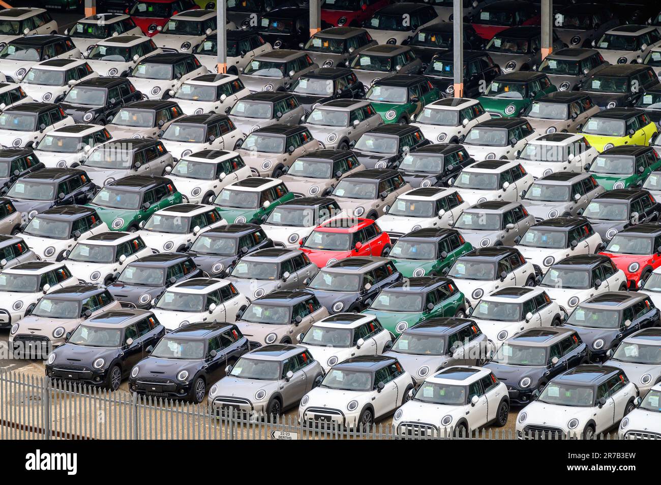 Mini cars lined up for export on the dockside at the Port of Southampton. Stock Photo
