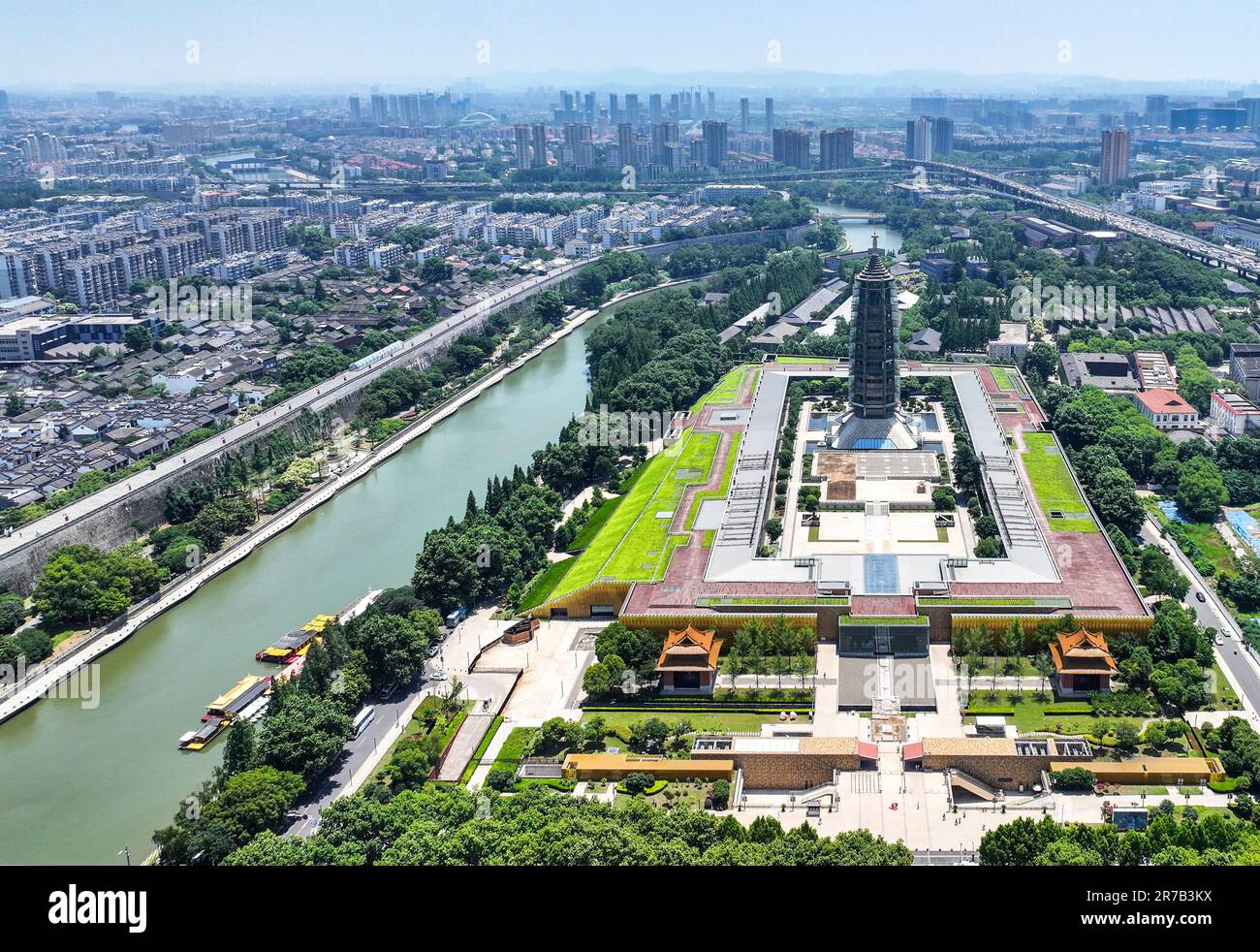 Nanjing. 9th June, 2023. This aerial photo taken on June 9, 2023 shows a  view of the Grand Baoen Temple Heritage and Scenic Area and the Qinhuai  River in Nanjing, east China's