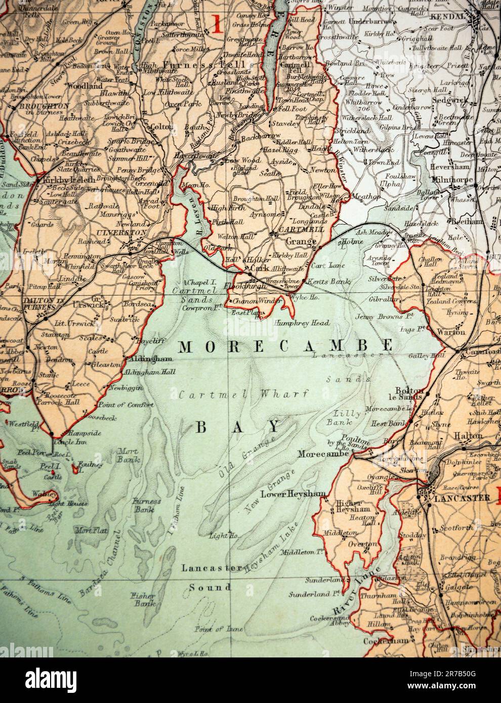 Detail from an 1868 Map of the County Palatine of Lancaster, so Lancashire as it was then, From the Ordnance Survey by J. Bartholomew F.R.G.S.; this section including Lancaster, Morecambe, Lower Heysham, River Lune, Cartmell, Ulverston, Dalton in Furness, Bardsea, Grange, Warton, Carnforth, Broughton in Furness, Newby Bridge, Bolton le Sands, Cark, Flookburgh, Morecambe Bay. In the cream tinted area are Kendal, Milnthorpe and Beetham. Stock Photo
