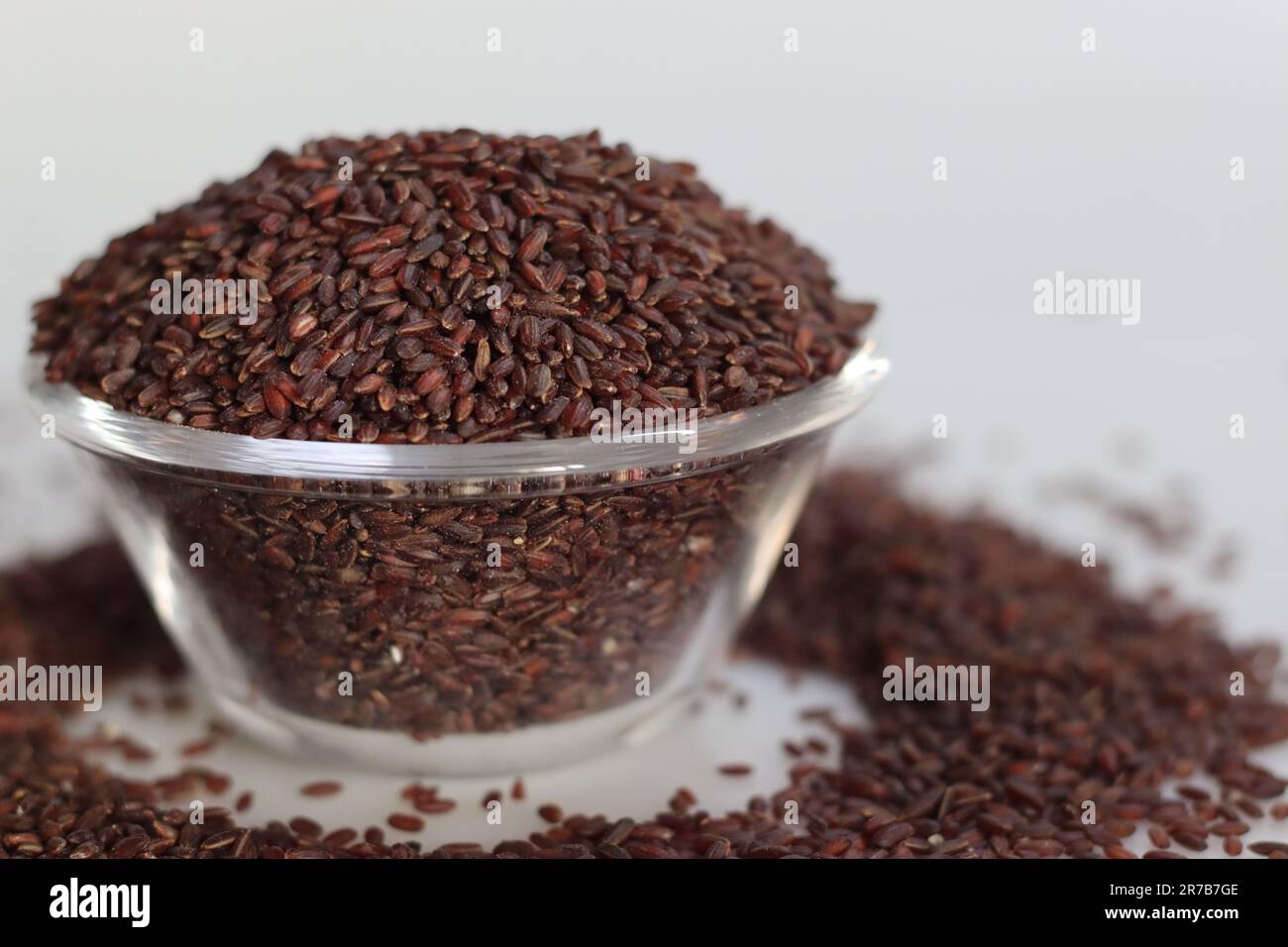 Poongar Rice in a glass bowl. It is a traditional unpolished rice with