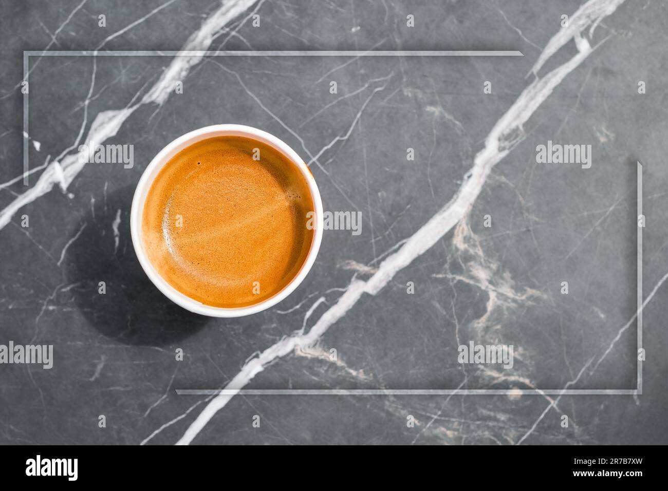 Espresso coffee poster or advertising concept, cup of hot espresso coffee in paper cup, cup isolated in gray frame, coffee break, free space for text Stock Photo