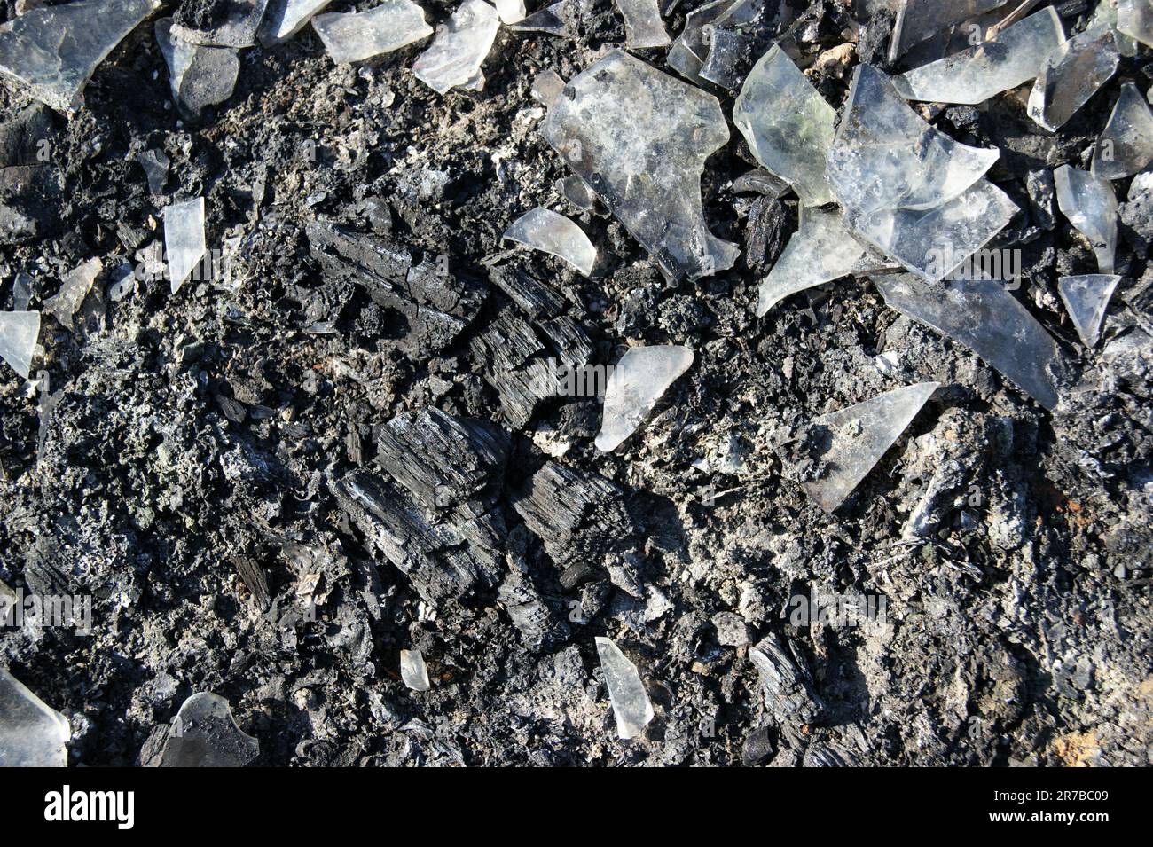 Consequences of the fire. Glass ash and coal Stock Photo Alamy