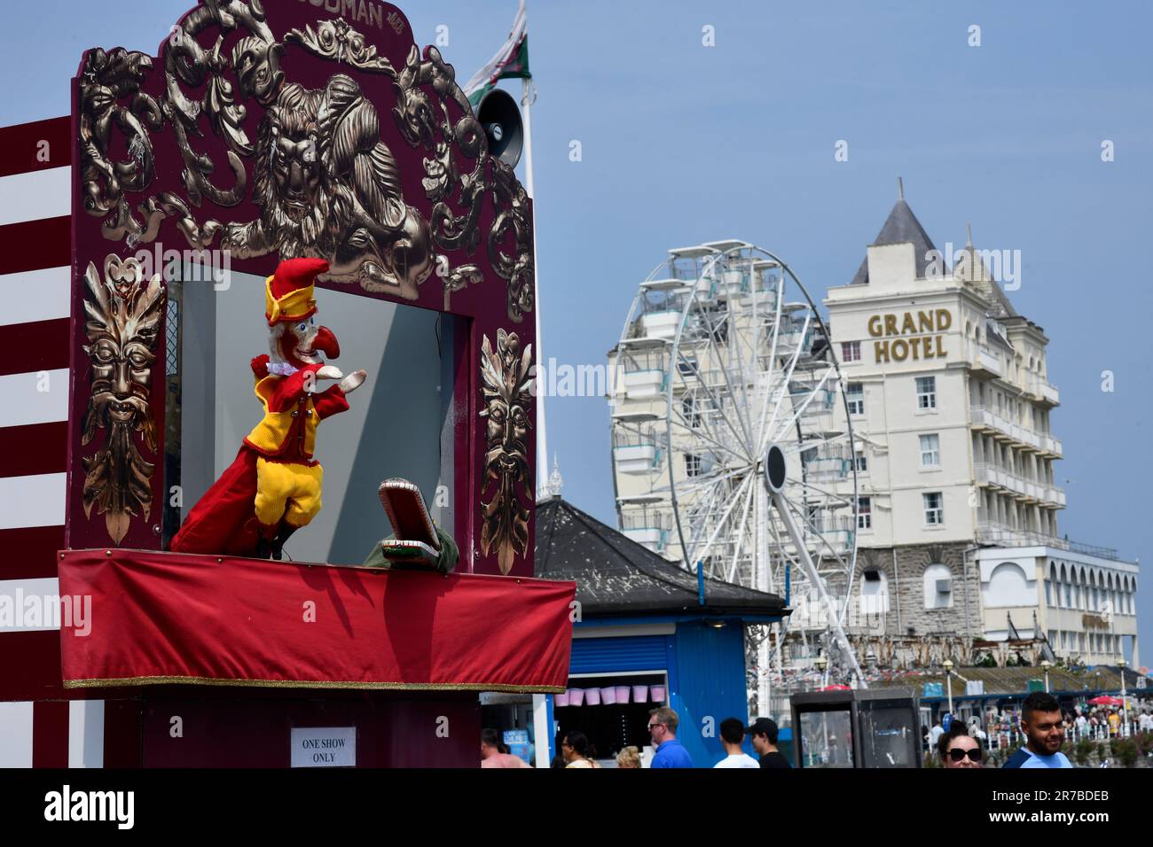 Children watching Professor Codman's traditional Punch and Judy show on