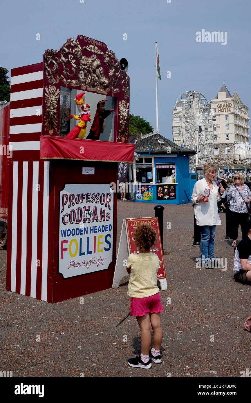 Children watching Professor Codman's traditional Punch and Judy show on