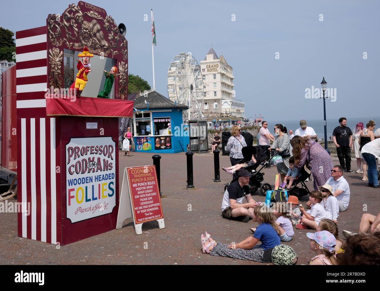Children watching Professor Codman's traditional Punch and Judy show on