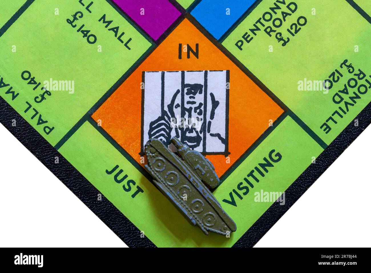 In Jail Just Visiting with tank token on Vintage Monopoly Property Trading Board Game Trade Mark 711981 Stock Photo