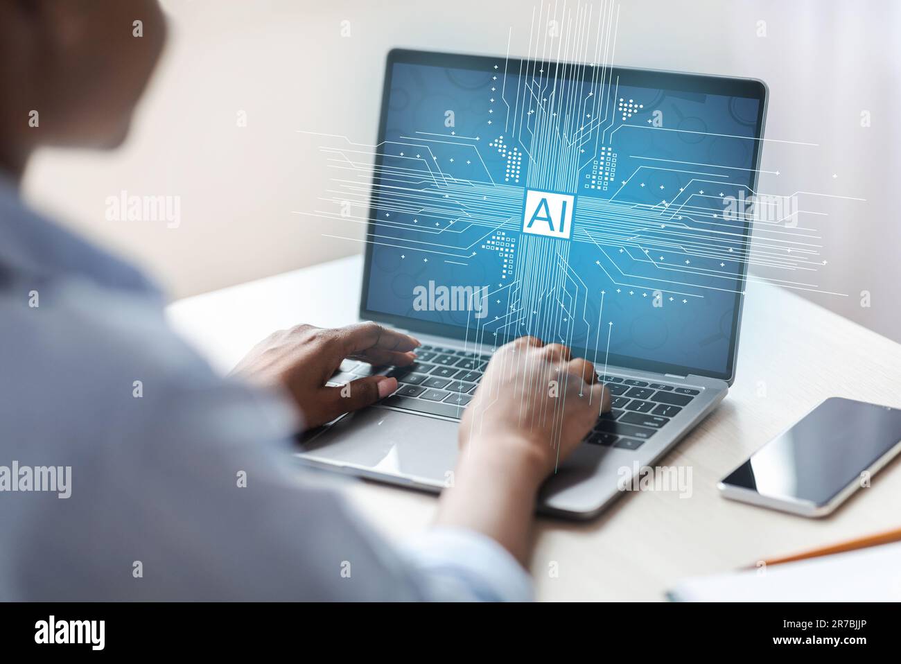 Black woman typing on laptop keyboard, using artificial intelligence Stock Photo