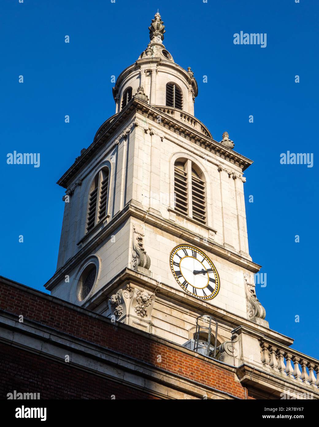 Looking up at the tower of St. Botolph-without-Bishopsgate, in the City of London, UK. Stock Photo