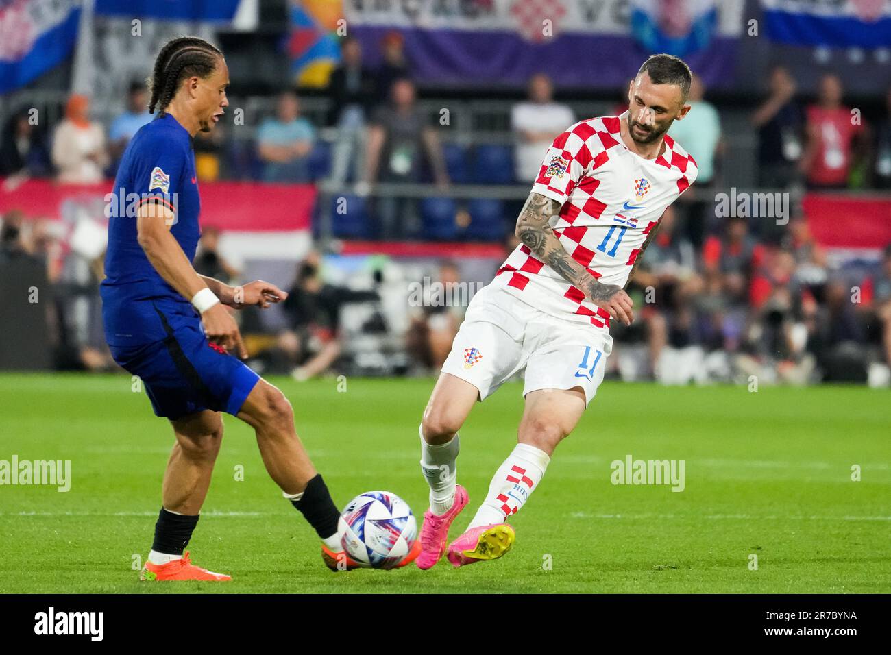 Rotterdam, Netherlands. 14th June, 2023. Rotterdam - Xavi Simons of Holland, Marcelo Brozovic of Croatia during the match between Netherlands v Croatia at Stadion Feijenoord De Kuip on 14 June 2023 in Rotterdam, Netherlands. Credit: box to box pictures/Alamy Live News Stock Photo