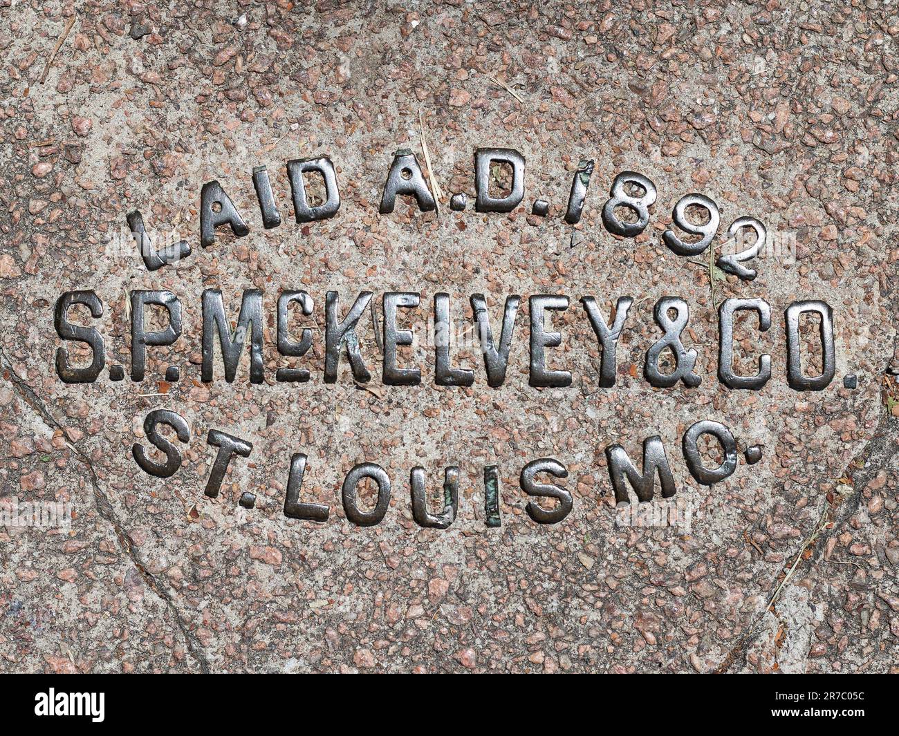 Brass sidewalk stamp in St. Louis Stock Photo Alamy