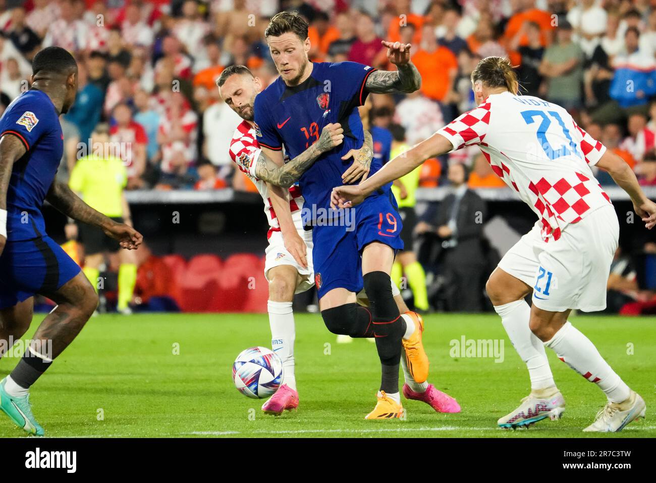 Rotterdam, Netherlands. 14th June, 2023. Rotterdam - Marcelo Brozovic of Croatia, Wout Weghorst of Holland during the match between Netherlands v Croatia at Stadion Feijenoord De Kuip on 14 June 2023 in Rotterdam, Netherlands. Credit: box to box pictures/Alamy Live News Stock Photo
