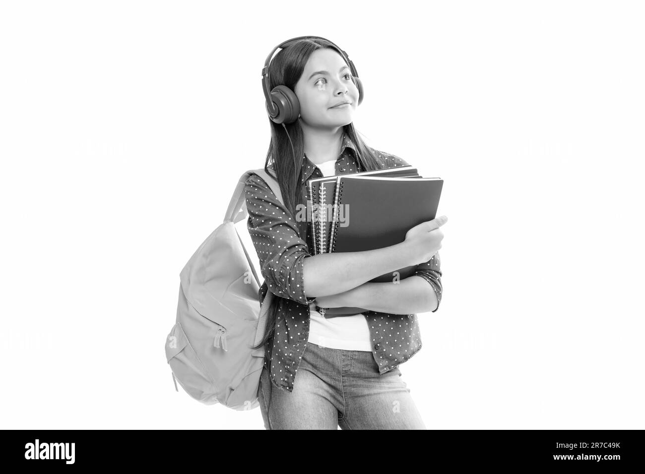 Schoolchild, teenage student girl with headphones and school bag ...