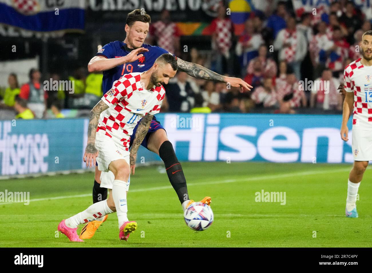 Rotterdam, Netherlands. 14th June, 2023. Rotterdam - Marcelo Brozovic of Croatia, Wout Weghorst of Holland during the match between Netherlands v Croatia at Stadion Feijenoord De Kuip on 14 June 2023 in Rotterdam, Netherlands. Credit: box to box pictures/Alamy Live News Stock Photo