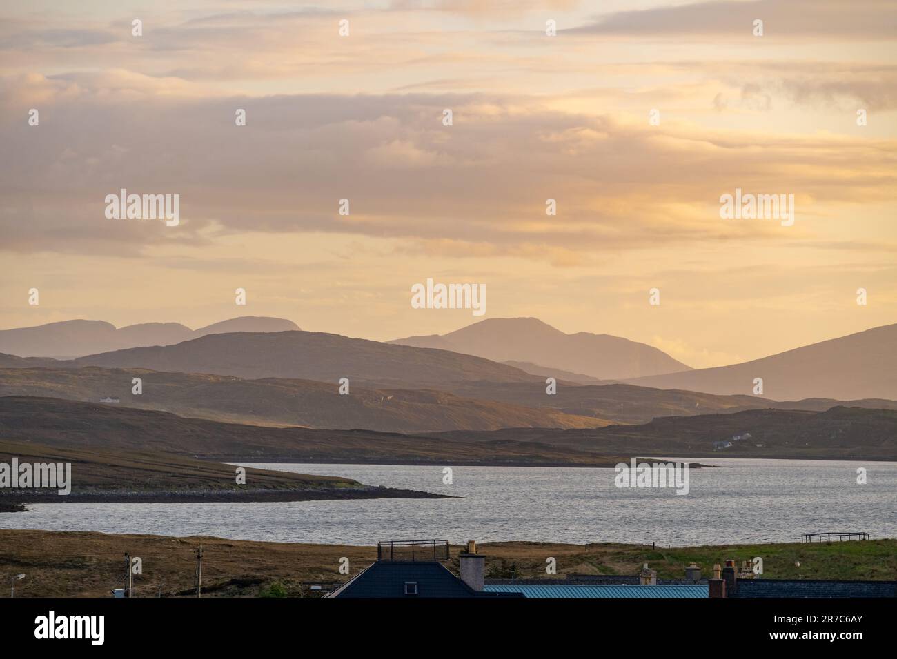 Looking towards the mountains off Harris from Breascleit on Lewis. Stock Photo