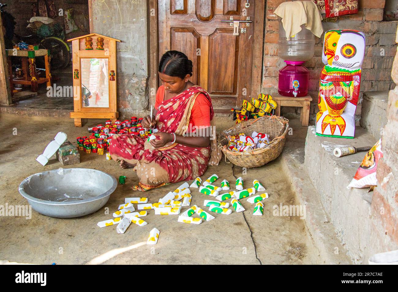 image of wooden doll making process and finished product Stock Photo Alamy