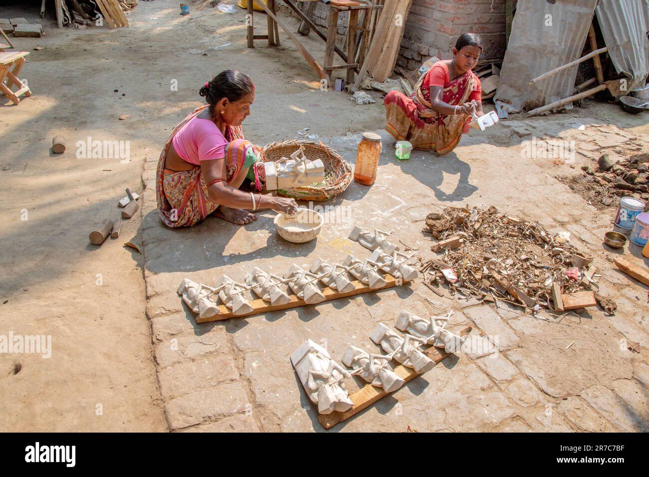 image of wooden doll making process and finished product Stock Photo